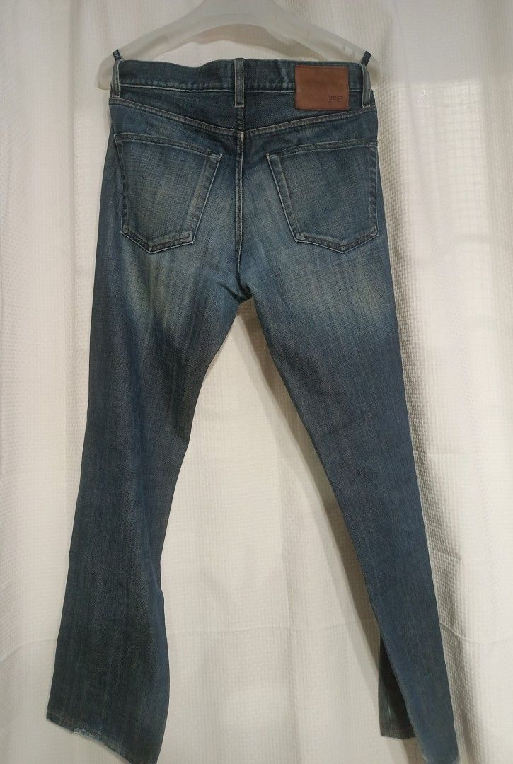 BOSS Hugo Boss Jeans (Category: Jeans) located in Cavite. Submitted by ag_closet (Listing ID 1415049102, Image 3). Description: - BOSS Hugo Boss jeans - Dark wash - Button fly - Classic five-pocket design - Regular fit - Leather BOSS logo patch - Came from UAE PM for more details! ✨.