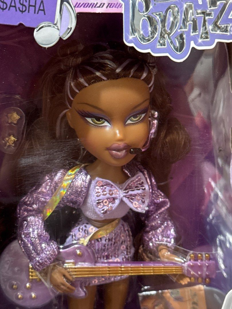 Bratz Pop Starz Sasha Doll (Category: Kids Toys) located in Manila. Submitted by judeo. (Listing ID 1415150068, Image 2). Description: ONHAN❤️💋 Bratz Pop Starz Sasha doll - Includes guitar - Box features a world tour theme - with a little dent on the box Pm for inquiries! Fb: judith grey.