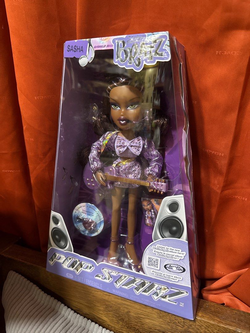 Bratz Pop Starz Sasha Doll (Category: Kids Toys) located in Manila. Submitted by judeo. (Listing ID 1415150068, Image 3). Description: ONHAN❤️💋 Bratz Pop Starz Sasha doll - Includes guitar - Box features a world tour theme - with a little dent on the box Pm for inquiries! Fb: judith grey.