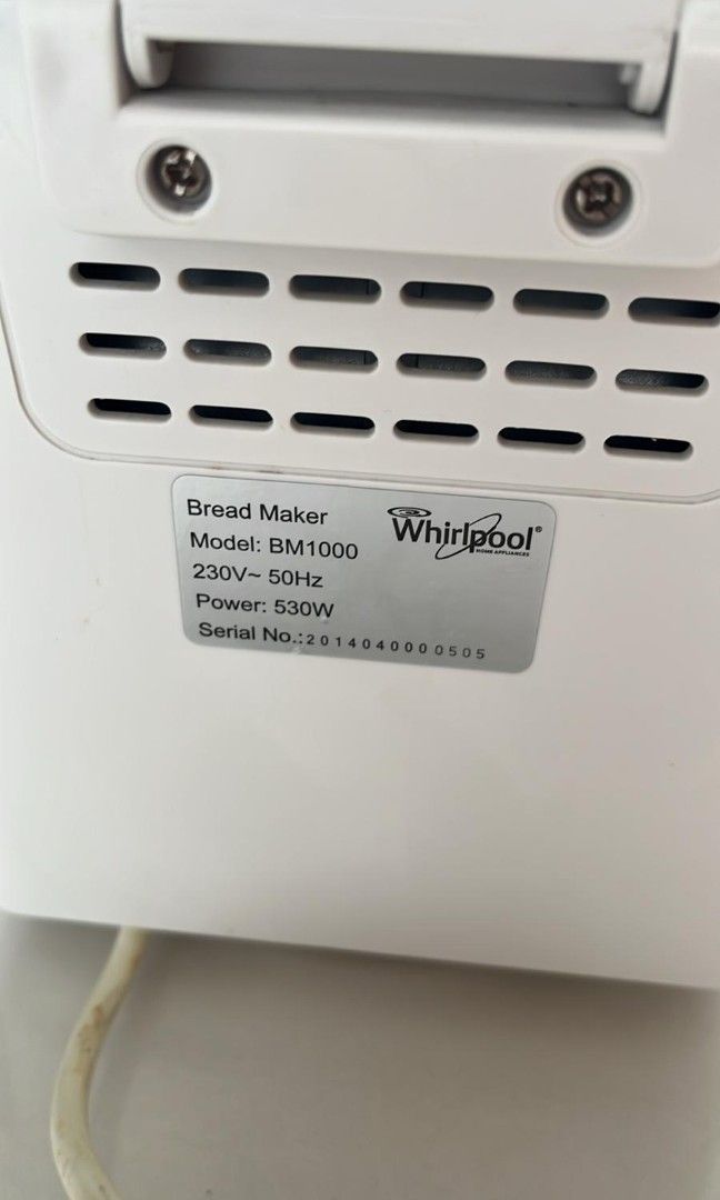 Bread Maker - Multiple Settings (Category: Breadmakers) located in Singapore. Submitted by henryhuat (Listing ID 1413582961, Image 3). Description: Bread maker offers a variety of settings including basic, french, whole wheat, quick, sweet, gluten free, ultra fast, dough, jam, cake, noodle, and bake. It has a digital display and adjustable color and time settings. Ready to make fresh bread!.