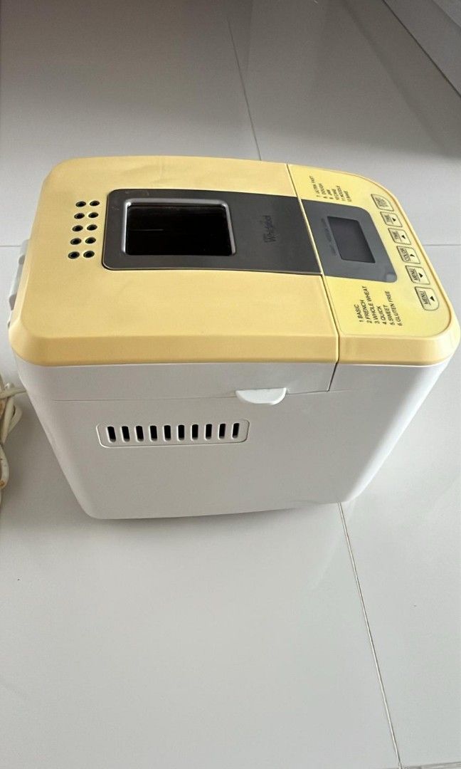 Bread Maker - Multiple Settings (Category: Breadmakers) located in Singapore. Submitted by henryhuat (Listing ID 1413582961, Image 2). Description: Bread maker offers a variety of settings including basic, french, whole wheat, quick, sweet, gluten free, ultra fast, dough, jam, cake, noodle, and bake. It has a digital display and adjustable color and time settings. Ready to make fresh bread!.
