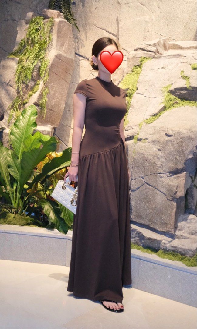 Brown Maxi Dress not h&m (Category: Dresses) located in Bulacan. Submitted by prelovedbycms (Listing ID 1415151644, Image 1). Description: - Elegant brown maxi dress - Fitted bodice with short sleeves - Flowing, floor-length skirt - Unique asymmetrical waist design - Comfortable fabric - Ideal for special occasions and everyday wear.