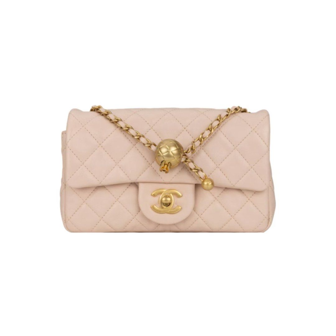 Chanel Mini Pearl Crush (Category: Luxury Bags & Wallets) located in Quezon City. Submitted by luv4luxxe (Listing ID 1415221537, Image 1). Description: Chanel handbag in light pink quilted lambskin leather. Features a gold adjustable chain with pearl crush detail. Negotiable PM for more pics.