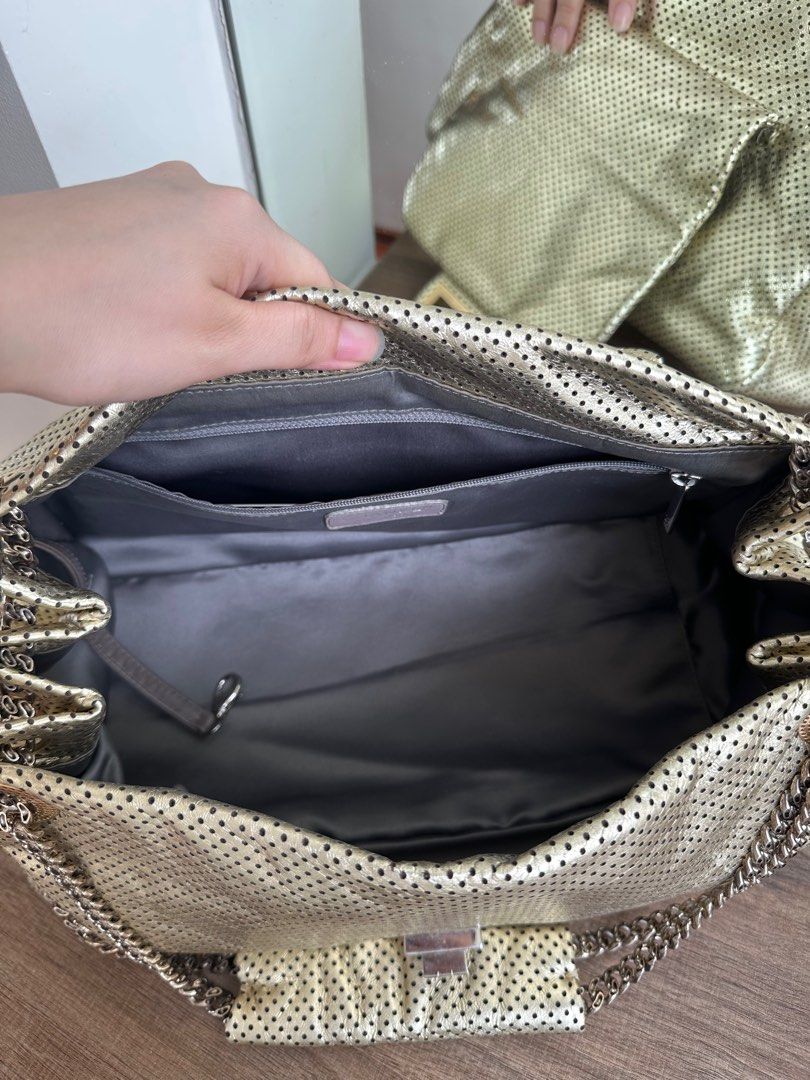 Chanel Perforated Leather Shoulder Bag (Category: Luxury Bags & Wallets) located in Quezon City. Submitted by alysstrade (Listing ID 1415114118, Image 2). Description: - Authentic Chanel shoulder bag - Gold perforated leather - Chain strap - Flap closure with logo detail - Main compartment - Slip pocket - Includes authenticity card - Made in Italy.