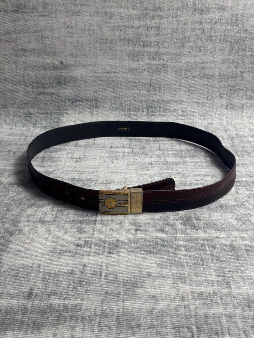 Dior - Vintage Leather Belt (Category: Belts) located in Manila. Submitted by members-only (Listing ID 1415206146, Image 3). Description: Dior Vintage Leather Belt Black/ Brown Leather Gold and Silver Buckle Still in great condition for its age No major issue Sign of wear Presentable.