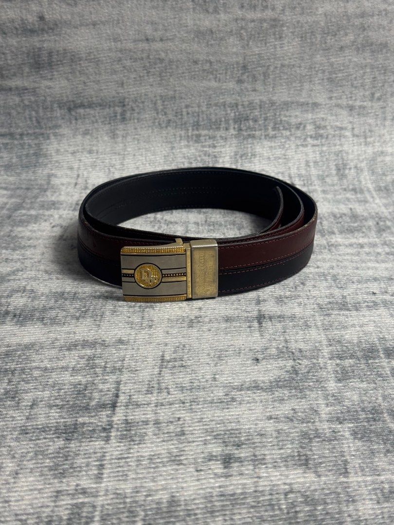Dior - Vintage Leather Belt (Category: Belts) located in Manila. Submitted by members-only (Listing ID 1415206146, Image 2). Description: Dior Vintage Leather Belt Black/ Brown Leather Gold and Silver Buckle Still in great condition for its age No major issue Sign of wear Presentable.