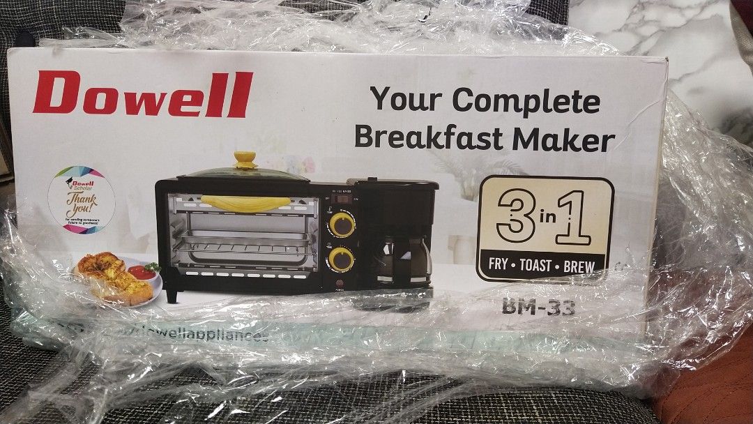 Dowell 3-in-1 Breakfast Maker BM-33 (Category: Ovens & Toasters) located in Las Pinas. Submitted by younggem.d97325 (Listing ID 1415053637, Image 1). Description: Dowell BM-33 is a 3-in-1 breakfast maker that can fry, toast, and brew. It has a 4-cup capacity and a temperature range of 100-230°C. Features include a temperature selector, a 30-minute timer, and removable accessories for easy cleaning. Accessories include a non-stick frying pan, crum