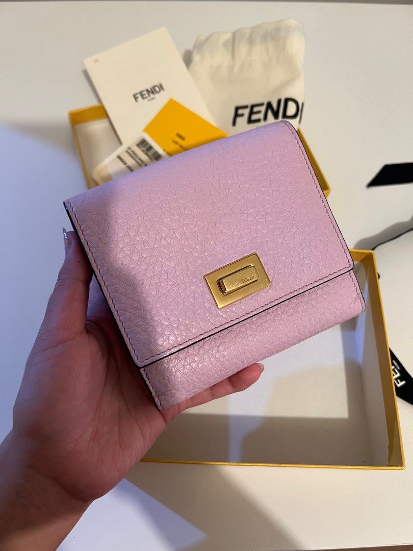 Fendi Peekaboo Wallet (Category: Luxury Bags & Wallets) located in Pasay City. Submitted by chii.b (Listing ID 1415143186, Image 2). Description: - Authentic Fendi Peekaboo wallet - Soft lavender color - Gold-tone clasp - Multiple card slots - Includes original box, dust bag, and authenticity cards - Made in Italy.