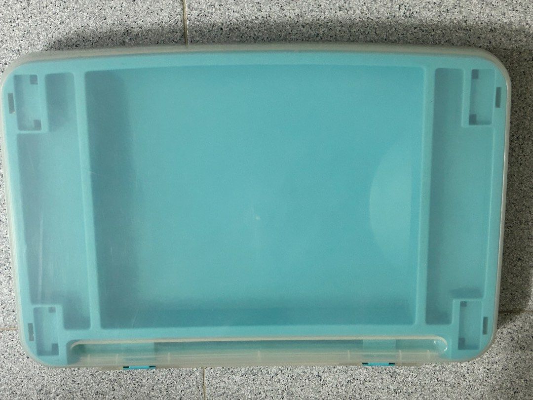 Foldable small table (Category: Tables & Sets) located in Singapore. Submitted by swift.duriandurian (Listing ID 1344057607, Image 2). Description: Sturdy plastic table with storage for stationery. Good for children using for drawing or writing. Space saving when folded and light weight to carry out. Size LBH 45 by 30 by 20 cm .