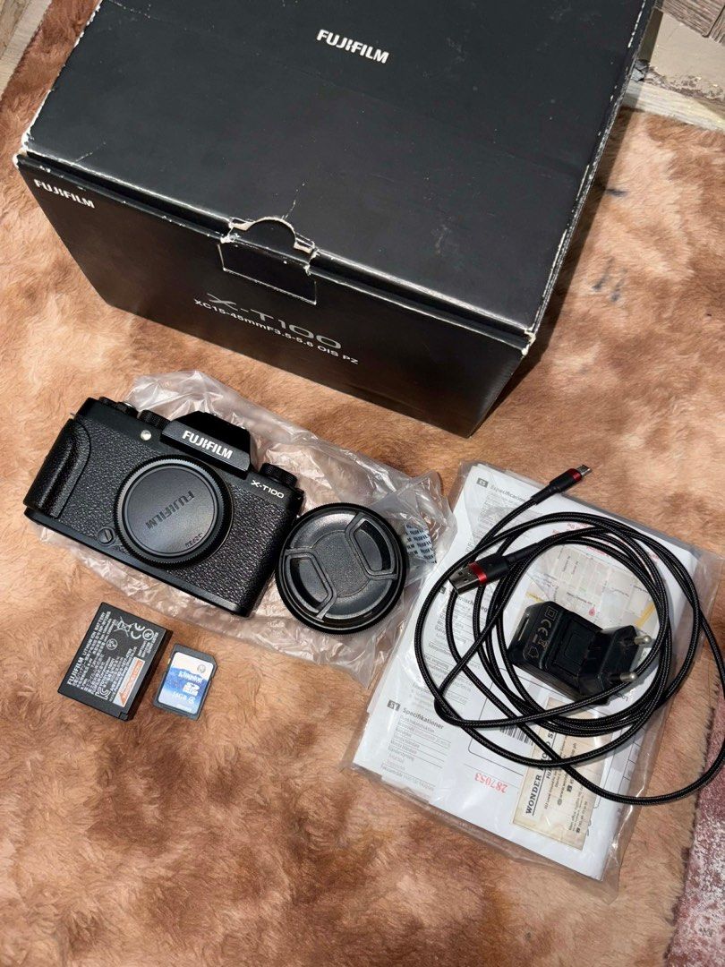 Fujifilm X-T100 Mirrorless Camera (Category: Cameras) located in Manila. Submitted by nikoll77 (Listing ID 1415066602, Image 2). Description: Fujifilm XT100 (boxed unit) 22,000 (negotiable) Reminder: Please check the prices and the issue before sending a DM inclusions: ⟢ unit ⟢ fujinon kit lens ⟢ battery ⟢ sd card ⟢ charger issue/s: 2 small purple stain — doesn’t affect the outputs condition: 9/10 GOOD FOR BEGINNER Caloocan, Metro Manila payment: