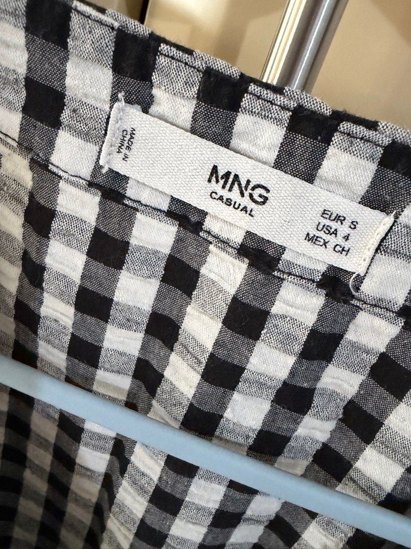 Gingham Check Dress with Belt (Category: Dresses) located in Taguig. Submitted by aopreloveditems (Listing ID 1415079965, Image 3). Description: - Black and white gingham check dress - V-neckline - Includes matching belt - Sleeveless - Midi length - Perfect for various occasions Dimensions when laid flat: Length: 37.5 in Waist: 13 in Bust: 15.5 in MOP: BPI, GCash Shipping within MM only. SF to be shouldered by buyer. .