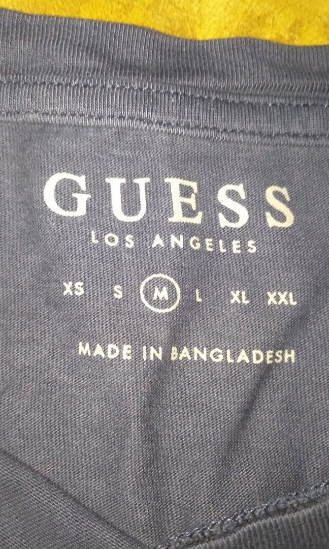 Guess Tshirt (Category: Tshirts & Polo Shirts ) located in Pila. Submitted by franklinsanity (Listing ID 1415155192, Image 2). Description: Dimension When Laid Flat Length - 26 inches width - 19 inches issue: pinhole sa lower left back portion, iron mark Dm if interested.