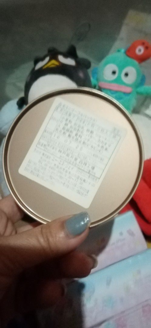 Hello Kitty Round Tin Box (Category: Storage Boxes & Baskets) located in Bulacan. Submitted by renasophiatoystore2020 (Listing ID 1415130534, Image 2). Description: - Adorable Kitty round tin box. - Features a white lid with a red Kitty design. - Gold-colored interior. - Includes a label with Japanese characters. - Perfect for collectors!.