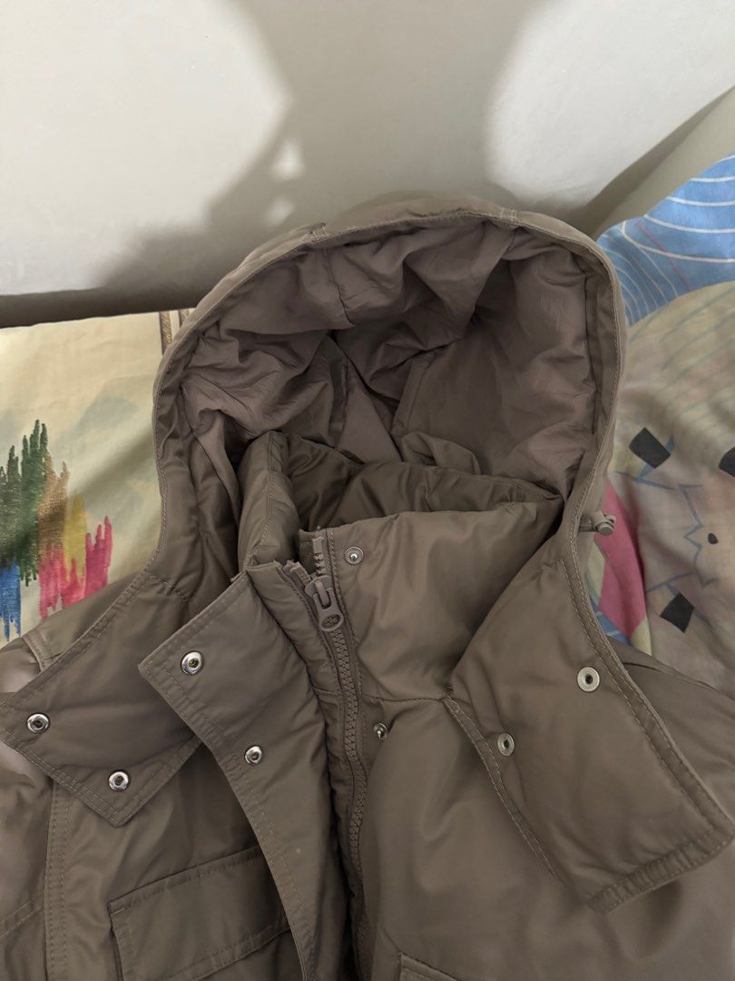 H&M Padded Jacket - Size L (Category: Coats, Jackets and Outerwear) located in Cabanatuan. Submitted by declutterpg (Listing ID 1415180982, Image 3). Description: - H&M Padded Jacket - Size: L - Features: Hood, multiple pockets, side snap buttons - Closure: Zip and snap buttons - Color: Neutral - Good for winter - Needs wash (stain behind right armpit going down).