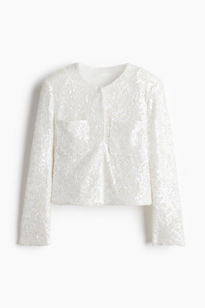 H&M Sequined blouse (Category: Coats, Jackets and Outerwear) located in Taguig. Submitted by httpgrant (Listing ID 1415223918, Image 1). Description: - WORN ONCE, like brand new - bought for 1,299 - Short blouse in sequined mesh with a round neckline, concealed press-studs down the front, patch chest pockets and long sleeves. Lined. - White sequin jacket - Round neckline - Long sleeves - Button closure - Two front pockets - Adds sparkle to any ou
