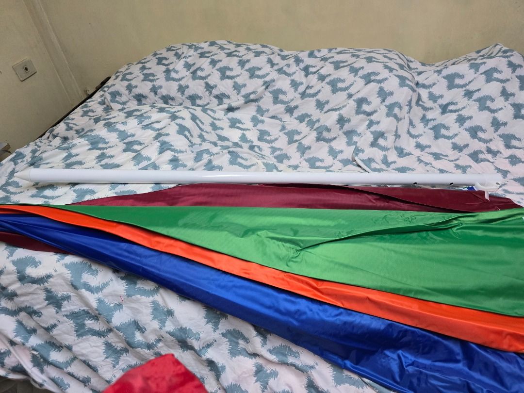 Homestar 45" Heavy Duty Umbrella (Category: Outdoor Furniture) located in Quezon City. Submitted by ellen72774 (Listing ID 1415042427, Image 3). Description: - Homestar 45" Heavy Duty umbrella - Sturdy white pole - Eye-catching blue and orange design - Includes a red carrying case - Ready for immediate use.