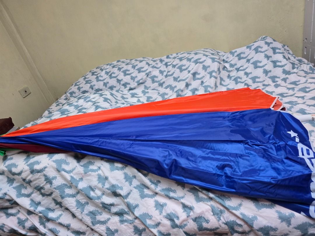 Homestar 45" Heavy Duty Umbrella (Category: Outdoor Furniture) located in Quezon City. Submitted by ellen72774 (Listing ID 1415042427, Image 2). Description: - Homestar 45" Heavy Duty umbrella - Sturdy white pole - Eye-catching blue and orange design - Includes a red carrying case - Ready for immediate use.