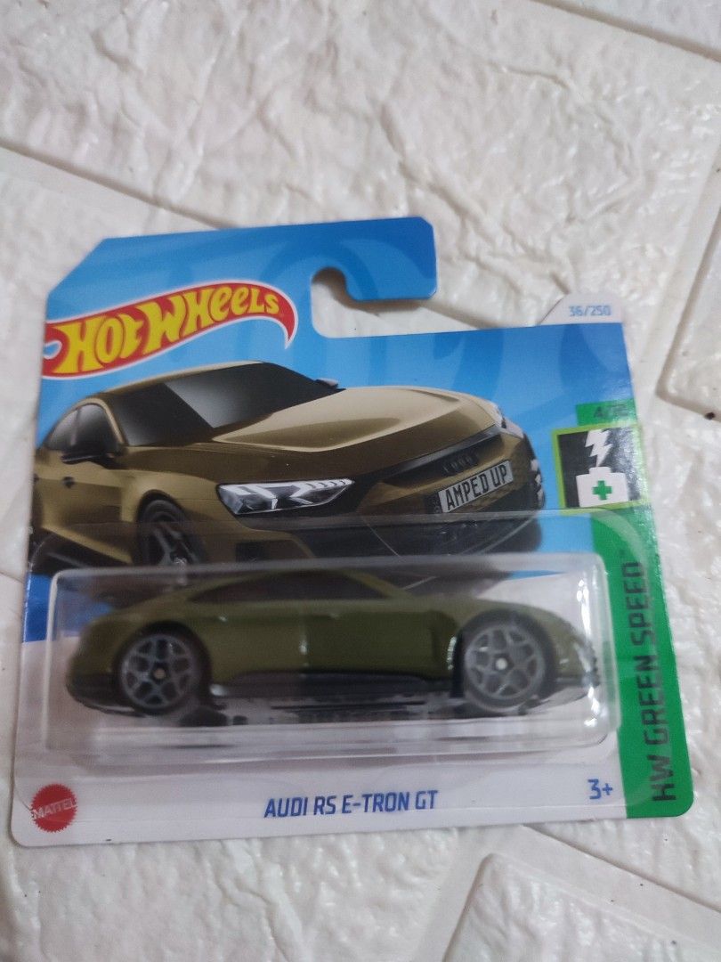 Hot Wheels Audi RS e-tron GT (Category: Vehicle & Diecast Models) located in Narvacan. Submitted by jigger85 (Listing ID 1415173704, Image 1). Description: - Hot Wheels Audi RS e-tron GT diecast car - Olive green color - Part of the HW Green Speed series (56/250) - Still in original packaging - Features the Hot Wheels logo and age recommendation (3+).