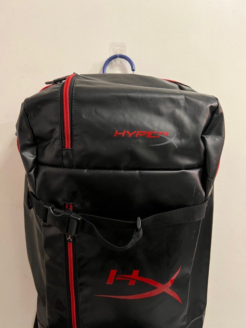 HyperX Gaming Backpack (Category: Backpacks) located in Manila. Submitted by almiradianneandres (Listing ID 1415174647, Image 3). Description: - HyperX gaming backpack - Black with red accents - Durable design - Multiple compartments for storage - Adjustable straps for comfort - Padded back support - HyperX logo on front and zipper pulls - Perfect for gaming gear or everyday use.