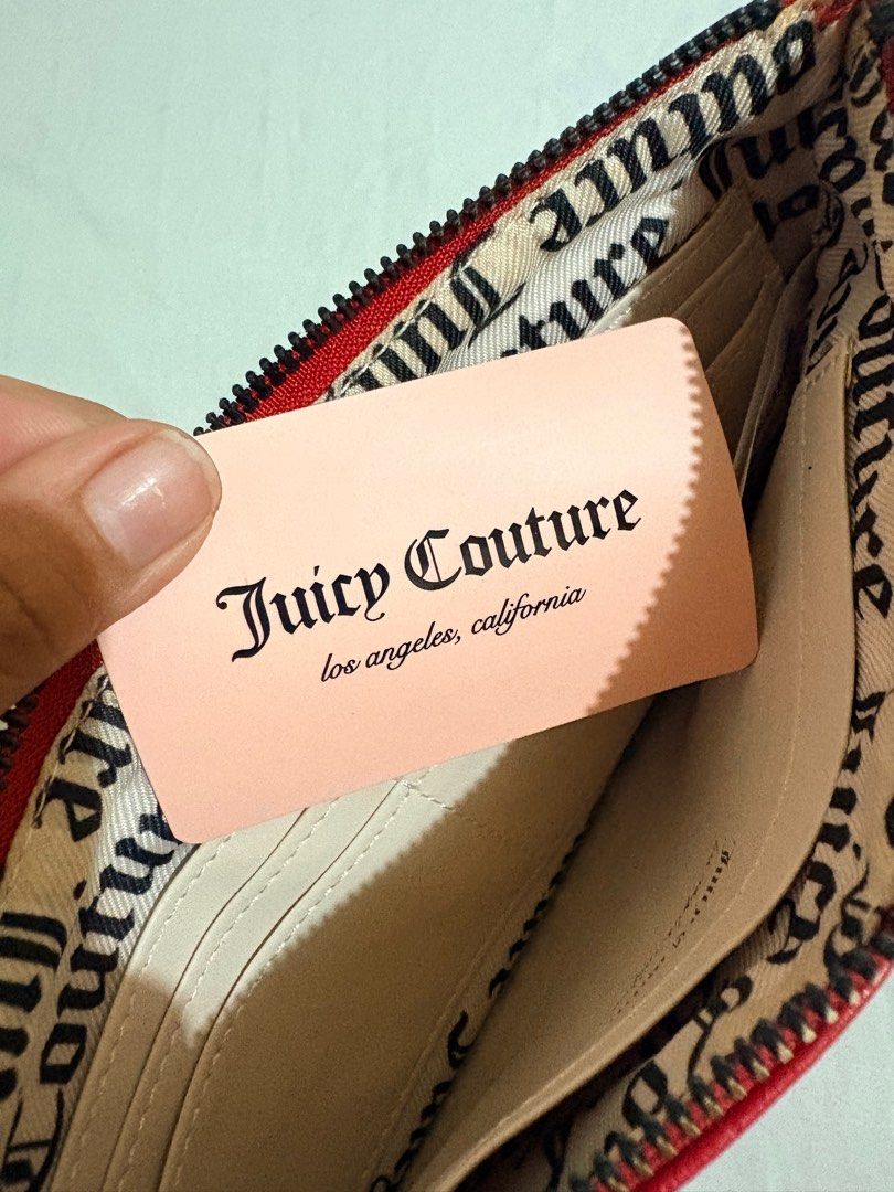 Juicy Couture Pouch with card holder slots inside (Category: Purses & Pouches) located in Cainta. Submitted by anjvee (Listing ID 1415235093, Image 3). Description: Red Juicy Couture pouch > Haven’t been used. Natago lang talaga sa closet > Still has the tag/card inside > Has card holder slots > With wrist strap > Selling to declutter Feel free to message me for questions. :).