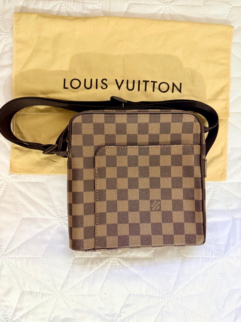 Louis Vuitton Damier Ebene Crossbody Bag (Category: Luxury Bags & Wallets) located in Imus. Submitted by krstn18 (Listing ID 1414201865, Image 1). Description: Brand: Louis Vuitton Damier Ebene Style: Unisex small crossbody / messenger bag Rank: A Made in Spain Highlights * damier ebene coated canvas body with leather trim * adjustable flat strap * top zip closure * front exterior slip pocket * interior slip pocket * brown * Serial Number: LM0026