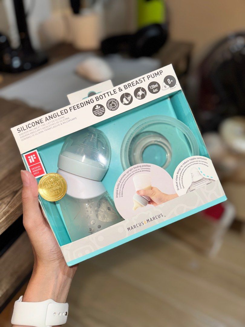 Marcus Marcus Silicone Angled Feeding Bottle & Breast Pump (Category: Breastfeeding & Bottle Feeding) located in Marikina City. Submitted by meowmingsksk (Listing ID 1415227482, Image 1). Description: - Marcus Marcus Angled Feeding Bottle & Breast Pump Set - For babies 0+ months - 120ml capacity - Includes bottle, breast pump component, and accessories - Angled silicone design - iF Design Award 2022 winner Note: • Few times ko lang nagamit kapag 