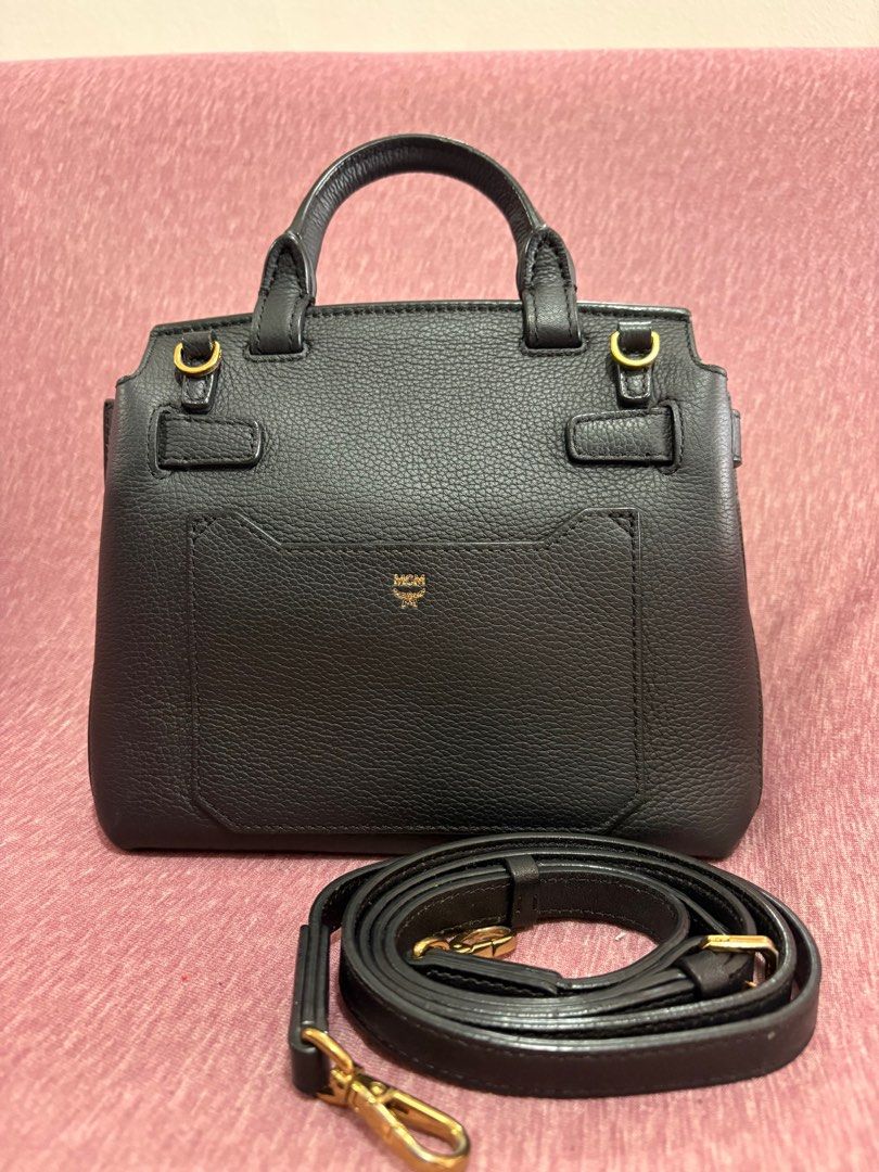 MCM Milla Small Leather Crossbody (Category: Luxury Bags & Wallets) located in Manila. Submitted by rvcr1694 (Listing ID 1415094664, Image 3). Description: MCM Milla Small Leather Crossbody Preloved, used good condition With normal wear and tear * Top handle, detachable adjustable crossbody strap * Turnlock flap closure; lined * Exterior slip pocket, interior slip pocket * 8.5”W x 4”D x 8”H; 2” handle drop, 22” strap drop * First photo for refere