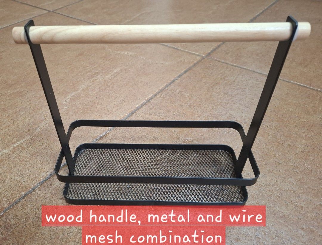 Metal and Wood Storage Basket (Category: Storage Boxes & Baskets) located in Cainta. Submitted by mama.sells (Listing ID 1415081750, Image 1). Description: - Metal wire mesh basket with a wooden handle. - Sturdy black metal frame. - Ideal for kitchen, bathroom, or general storage. - Adds style and organization to any space. RFS - cabinet cleaning.