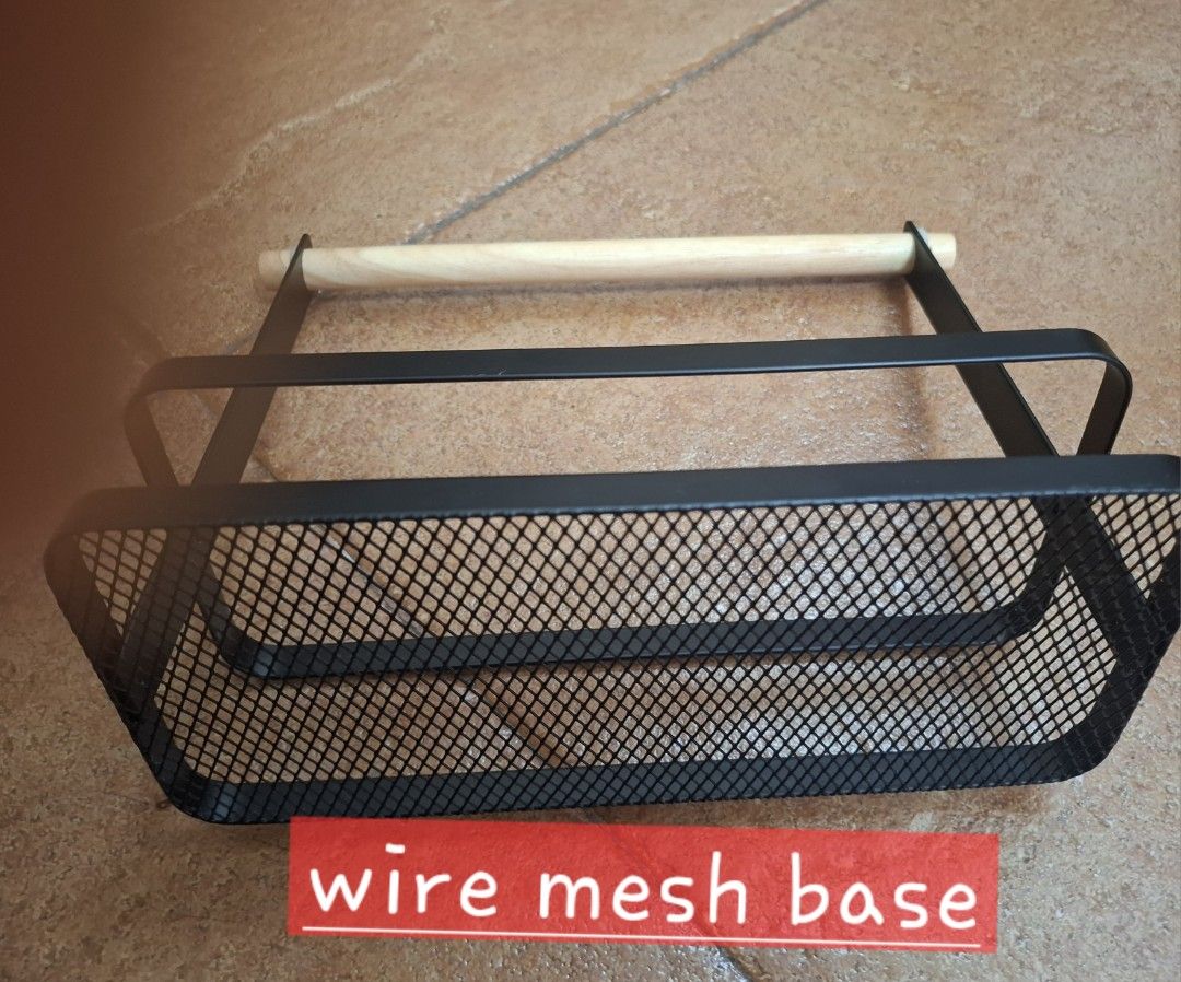 Metal and Wood Storage Basket (Category: Storage Boxes & Baskets) located in Cainta. Submitted by mama.sells (Listing ID 1415081750, Image 3). Description: - Metal wire mesh basket with a wooden handle. - Sturdy black metal frame. - Ideal for kitchen, bathroom, or general storage. - Adds style and organization to any space. RFS - cabinet cleaning.