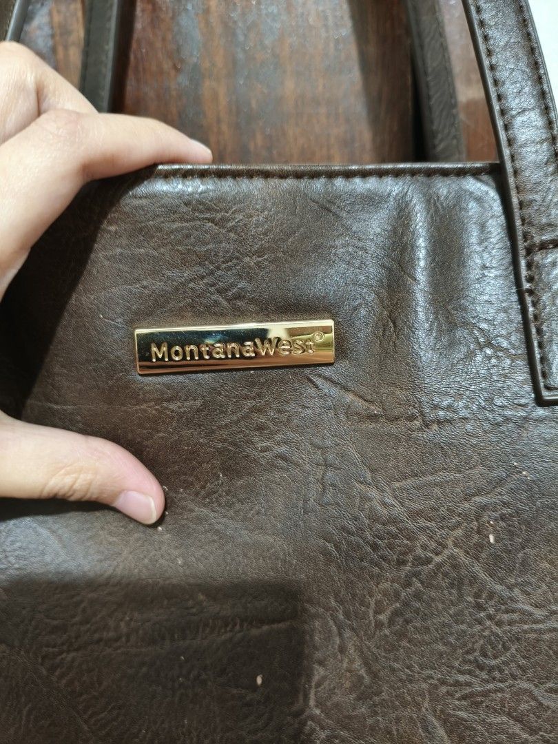 Montana West Brown Tote Bag (Category: Tote Bags) located in Quezon City. Submitted by pacho_25 (Listing ID 1415041192, Image 2). Description: Bag size: 43.1*26.6cm, 16.9*10.4 inch; it can hold 16 inch.