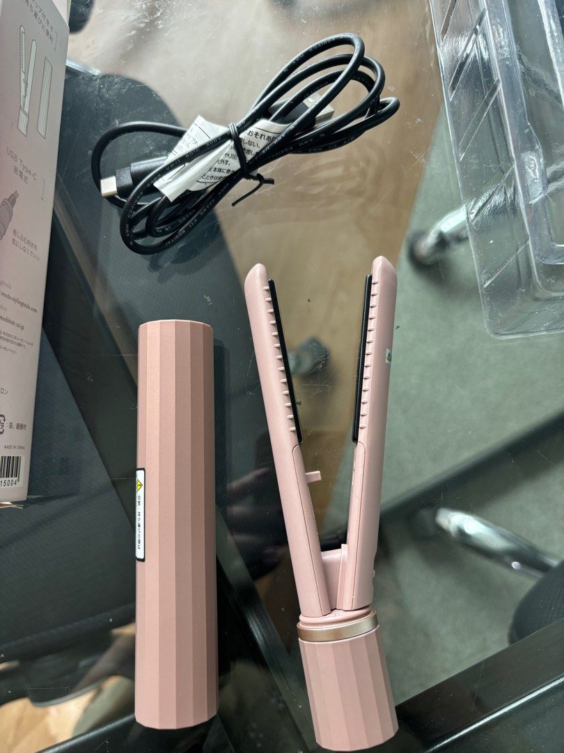 Mooshall Mobile Hair Iron (Category: Hair) located in Pasig City. Submitted by charis_g (Listing ID 1415137048, Image 3). Description: - Bought in Japan airport Mooshall mobile hair iron - Stylish rose gold color - Compact and portable design - Includes USB Type C charging cable - Perfect for on-the-go styling - Brand new in original packaging. Just tested the product..