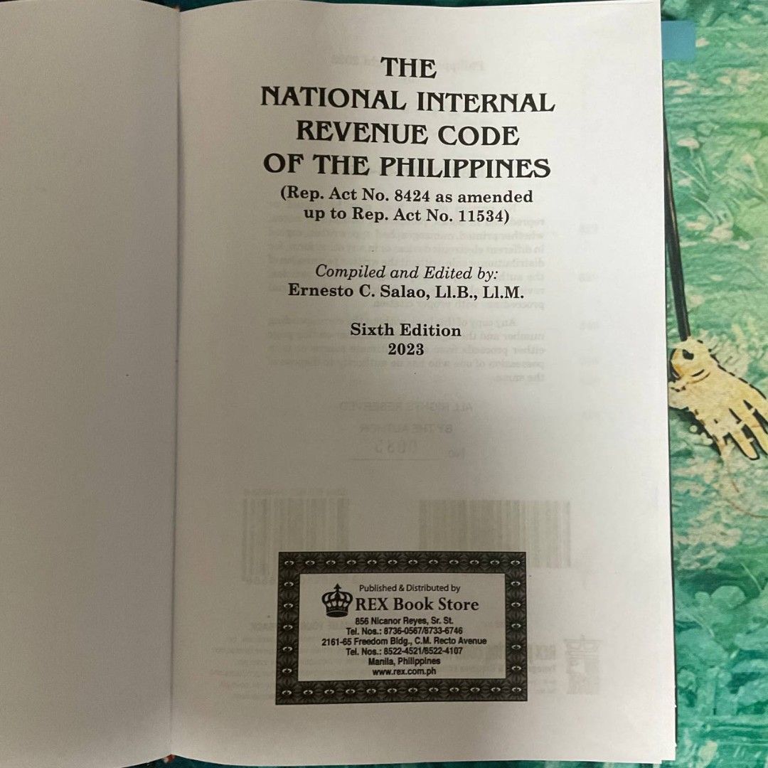 National Internal Revenue Code 2023 ed.(NIRC Tax Codal) (Category: Textbooks) located in Paranaque City. Submitted by prelovedby.aly (Listing ID 1415064223, Image 2). Description: National Internal Revenue Code 2023 ed. (NIRC Tax Codal) - Highlight on Section 22 (see 4th & 5th photo) - Good as new..