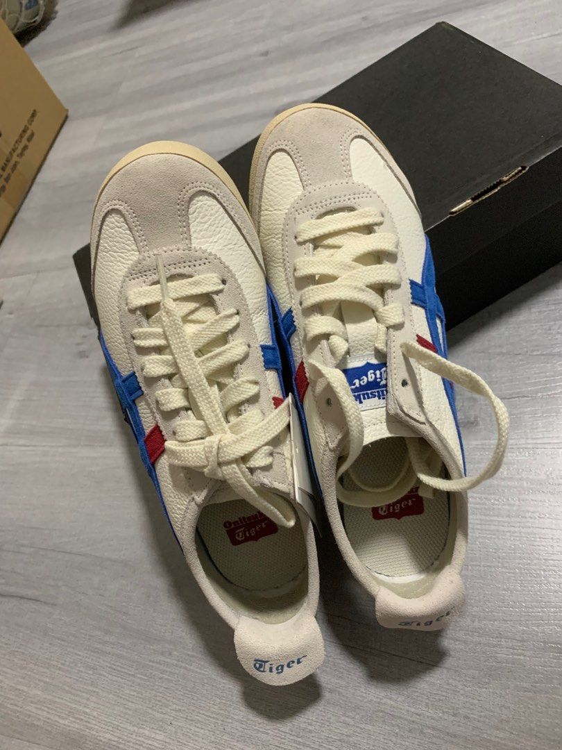Onitsuka Tiger Mexico 66 - White/Blue/Red (Category: Sneakers) located in Cainta. Submitted by JCJ_shoppe (Listing ID 1415045681, Image 3). Description: - Onitsuka Tiger Mexico 66 sneakers - very excellent used condition - Color: White with blue and red stripes - Size: 37.5 EUR, 5 US, 23.5 CM - Features: - Cream-colored sole and laces - Onitsuka Tiger logo on tongue and heel - Includes original box - Made in Indonesia.