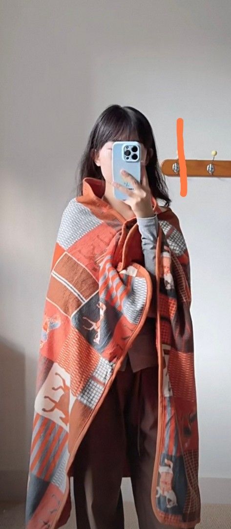 Orange Patterned Blanket (Category: Bedding & Towels) located in Singapore. Submitted by gsl_inc (Listing ID 1415213849, Image 1). Description: Cozy blanket features a unique orange and brown pattern. The blanket is soft and looks warm. Great for adding a touch of style to your home..