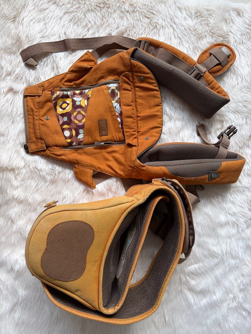 Original Picolo Baby Carrier (Category: Carriers & Slings) located in Cebu City. Submitted by happyheartcebu (Listing ID 1415100332, Image 2). Description: - Picco baby carrier - Brown and patterned design - Adjustable fit - Padded shoulder straps - Zippered pocket - Supportive waist belt - Designed for front-facing baby position Can’t find the cover for baby’s head. But all are complete and working :).