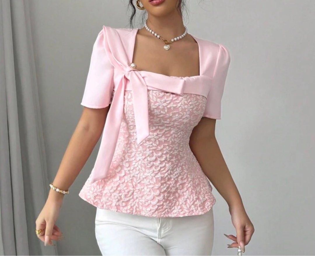 Pink Lace Top with Bow Detail (Category: Sleeveless) located in Taguig. Submitted by httpgrant (Listing ID 1415222855, Image 1). Description: - Pink top - Square neckline - Lace detailing - Short sleeves - Peplum hem - Bow accent - Suitable for special occasions.