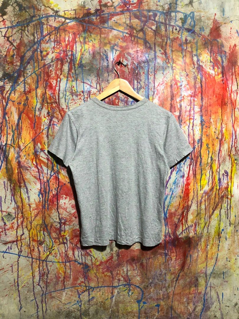 Play Comme des Garcons Double Heart Tshirt (Category: Luxury Apparel) located in Quezon City. Submitted by unholy_finds (Listing ID 1415094620, Image 2). Description: - Play Comme des Garcons T-shirt - Gray color - Size: L - Features the iconic Double heart logo - Made in Japan - Material: Cotton.