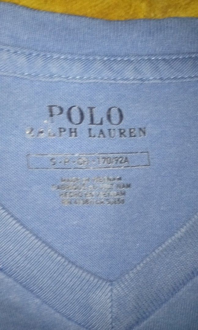 Polo by Ralph Lauren (Category: Tshirts & Polo Shirts ) located in Pila. Submitted by franklinsanity (Listing ID 1415153208, Image 2). Description: Dimension When laid flat Length - 27.5 inches width - 19 inches V-nech Small on tag but can fit medium built body Dm if interested.