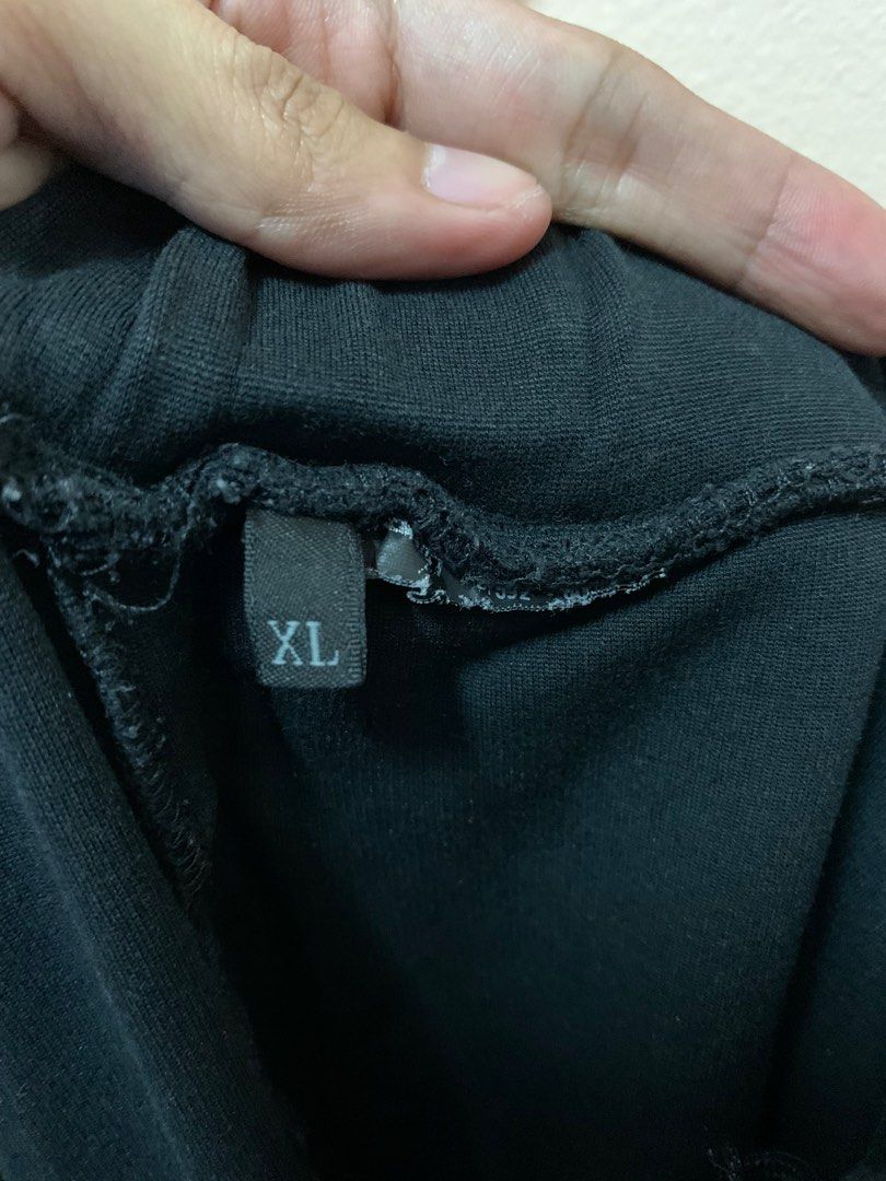 Prada Black Tab Jogger Pants (Category: Joggers) located in Manila. Submitted by excommunicado_ (Listing ID 1415134934, Image 3). Description: Prada Jogger Pants Black Tab Size XL on tag Dimensions: Waistline - 30 to 36” Length - 38” Inseam - 27” Thigh - 11” Knee - 7.5 Leg opening - 5” Very good condition Flaw: cut main tag & wash tag (auth) - Authentic Prada sweatpants - Size: XL - Features: - Zipper details - Prada logo patch - Ribbed cuffs - D