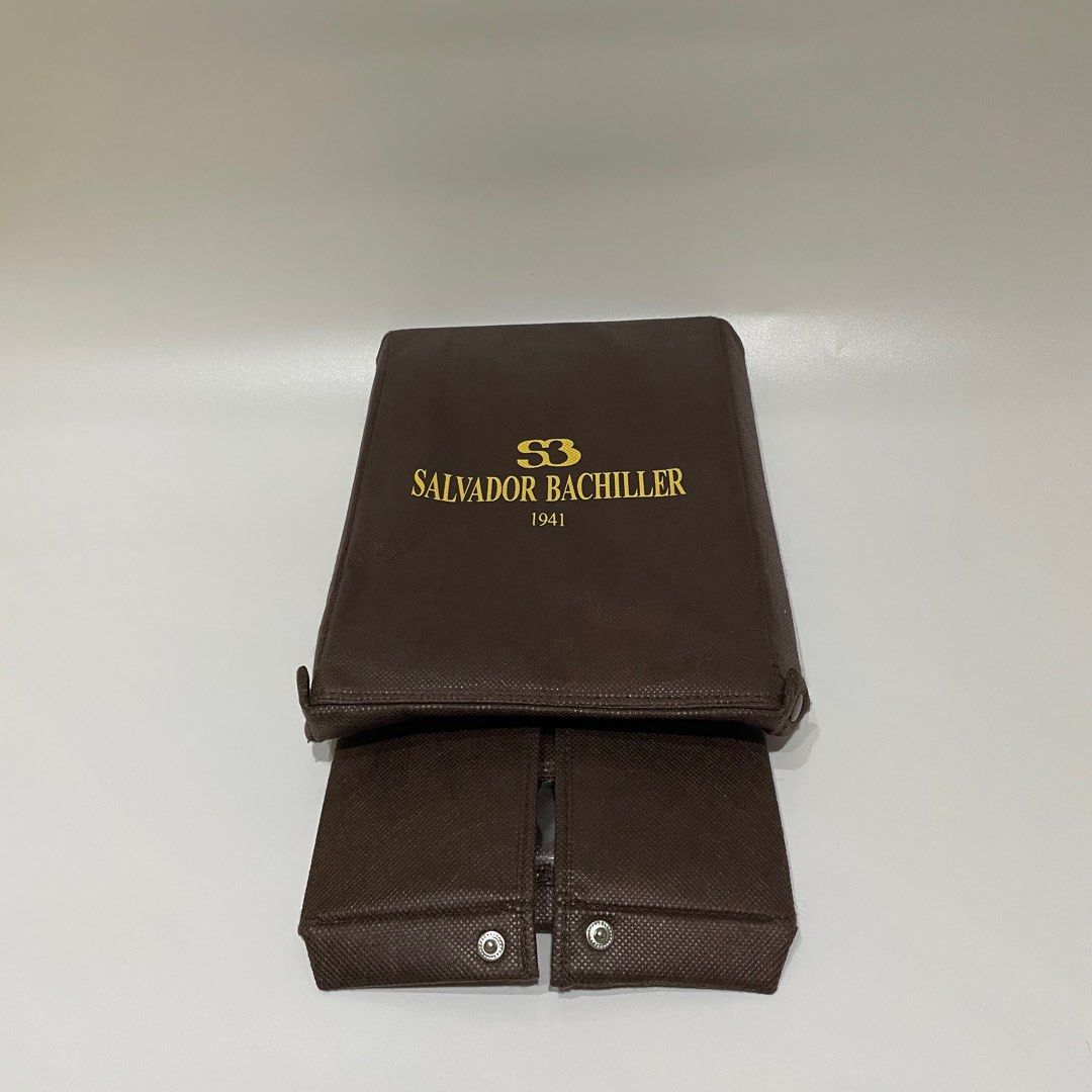 Salvador Bachiller Authentic Brown Shoe/Storage Box (Category: Storage Boxes & Baskets) located in Cavite. Submitted by kyukyuchan (Listing ID 1415062241, Image 2). Description: ✨50+ LISTINGS ON MY PROFILE✨ (SOME ITEMS ARE FROM BALIKBAYAN BOX, THUS, PACKAGINGS MIGHT BE REMOVED) Salvador Bachiller Authentic Brown Shoe/Storage Box - RFS: Decluttering/Lack of space - Foldable - Has outer fabric-like texture - Dimensions are already posted in photos 