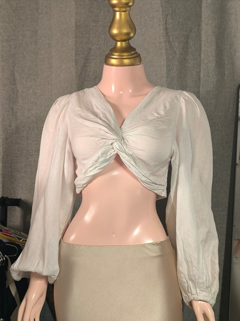 Seed Heritage White Crop Top - Medium (Category: Others Tops) located in Marikina City. Submitted by vaughnify (Listing ID 1412304799, Image 1). Description: Seed Heritage crop top blouse - Dirty White color - Size 10, Medium - V-neckline - Long sleeves with gathered cuffs - Twisted knot detail - Lightweight fabric -no flaws, like new 📍 Location: Marikina City 🚚 Courier Options: 🛍️ J&T Express • 2–3 days within Metro Manila • 3–5 days outside 