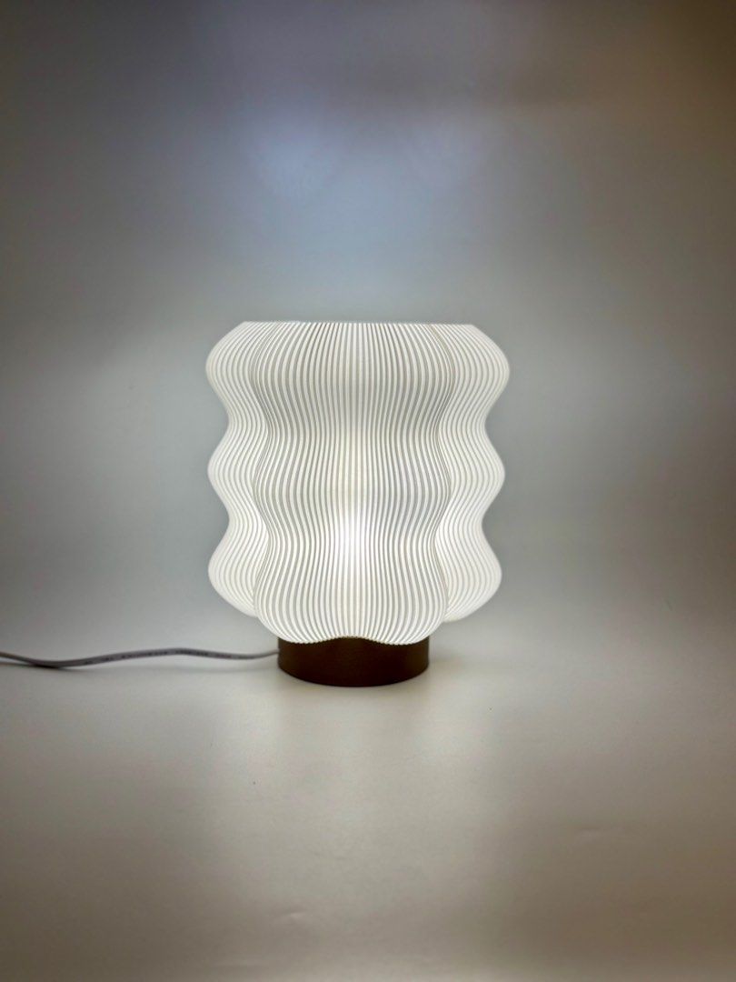 Seiryu Minimalist Modern Japandi Scandinavian Table Lamp (Category: Other Home Decor) located in Manila. Submitted by staylit.ph (Listing ID 1407162265, Image 2). Description: Seiryu Minimalist Modern Japandi Scandinavian Table Lamp • PhP 1,150 (Brand New) • Dimensions: 8”(20cm)H × 7”(18cm)W • Materials: High Quality 3d Filaments • Color: White Core & Brown Base • Features: Diffused Ambient Light • Styles: Minimalist, Modern, Japandi, Scandinavia