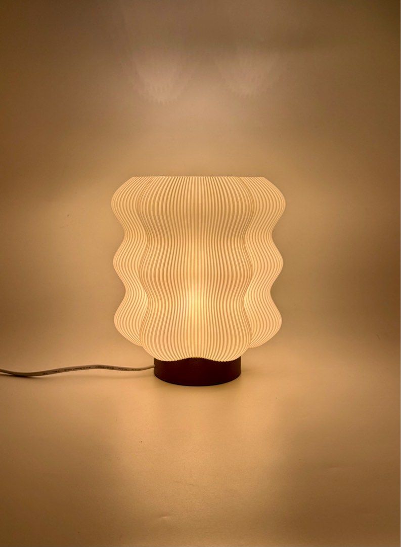 Seiryu Minimalist Modern Japandi Scandinavian Table Lamp (Category: Other Home Decor) located in Manila. Submitted by staylit.ph (Listing ID 1407162265, Image 1). Description: Seiryu Minimalist Modern Japandi Scandinavian Table Lamp • PhP 1,150 (Brand New) • Dimensions: 8”(20cm)H × 7”(18cm)W • Materials: High Quality 3d Filaments • Color: White Core & Brown Base • Features: Diffused Ambient Light • Styles: Minimalist, Modern, Japandi, Scandinavia
