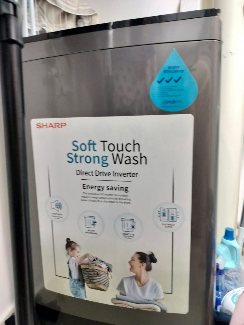 Sharp Top Load Washing Machine (Category: Washing Machines and Dryers) located in Singapore. Submitted by dimplesis (Listing ID 1415219081, Image 3). Description: BOUGHT IN NOV 2023 CONDITION STILL VERY GOOD NOTE:" Surface scratches on the tub rim, located on the grey plastic around the opening. Purely cosmetic and does not affect function" SELF COLLECT AT 654293 PRICE IS FIXED - Sharp top load washing machine - Energy-saving direct drive inverte