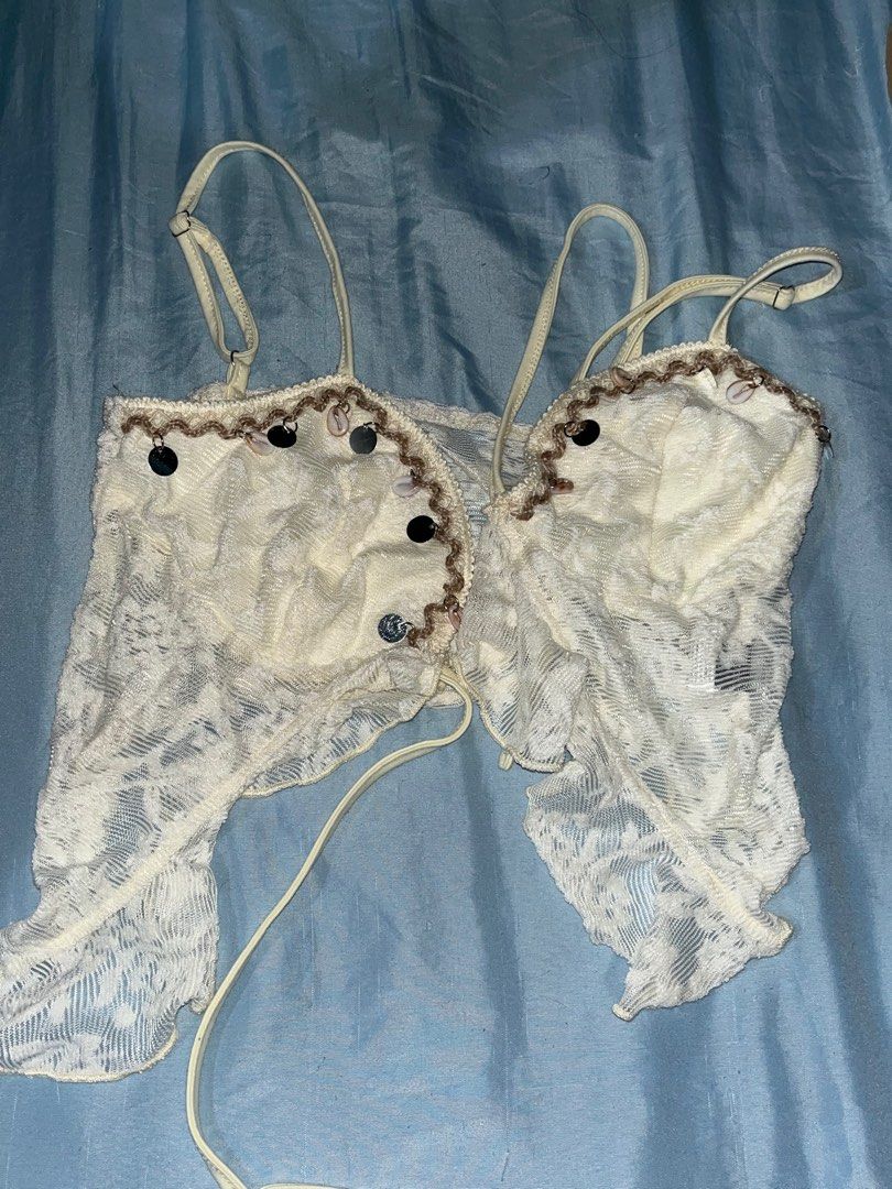 SHEIN ICON White Lace Top (Category: Sleeveless) located in Manila. Submitted by liaaa89 (Listing ID 1415171794, Image 2). Description: - SHEIN ICON top - White lace design - Bow detail - Spaghetti straps - Ruffled hem - Embellished neckline Never been used - From the "Trends" collection - Price: ₱305 (Original: ₱315) - Free shipping!.
