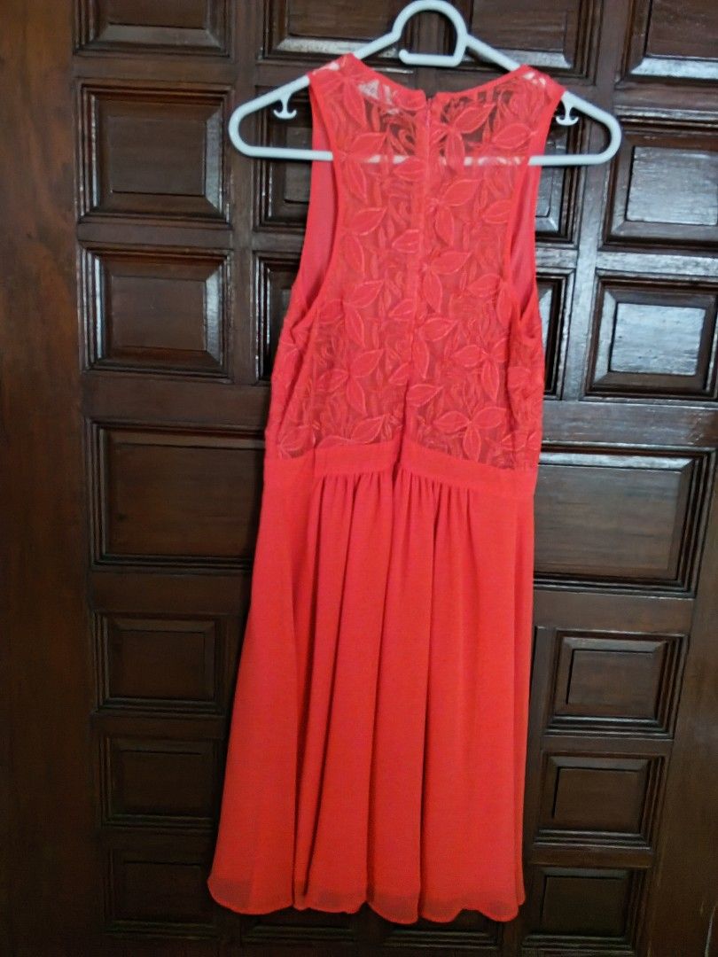 Spotlight by Warehouse Coral Dress (Category: Dresses) located in San Juan City. Submitted by yaz613 (Listing ID 1415078909, Image 3). Description: Very nice and so stunning Red Coral colored dress. - Coral-colored dress - Brand: Spotlight by Warehouse - Features floral lace bodice and flowing skirt - Round neckline - Zipper closure at the back - Size: UK 10, FR 38, D 36 - Ideal for special events and nights out Free shipping if the total amount 