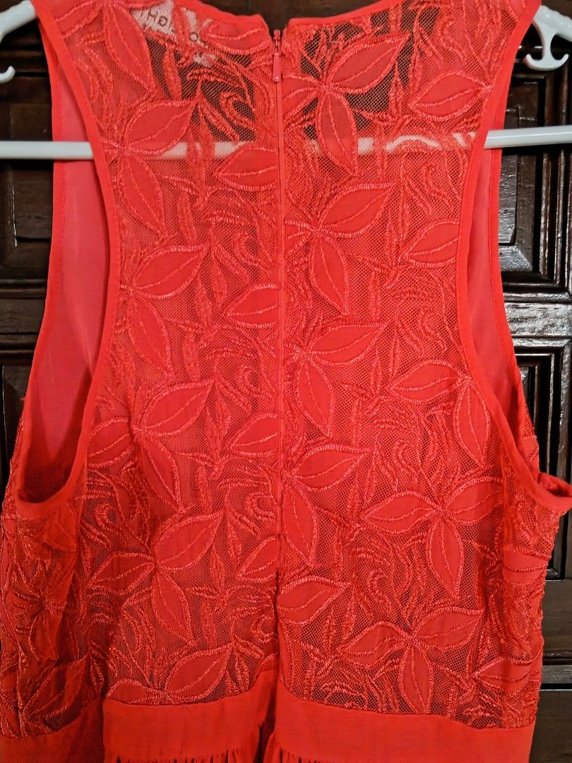 Spotlight by Warehouse Coral Dress (Category: Dresses) located in San Juan City. Submitted by yaz613 (Listing ID 1415078909, Image 2). Description: Very nice and so stunning Red Coral colored dress. - Coral-colored dress - Brand: Spotlight by Warehouse - Features floral lace bodice and flowing skirt - Round neckline - Zipper closure at the back - Size: UK 10, FR 38, D 36 - Ideal for special events and nights out Free shipping if the total amount 