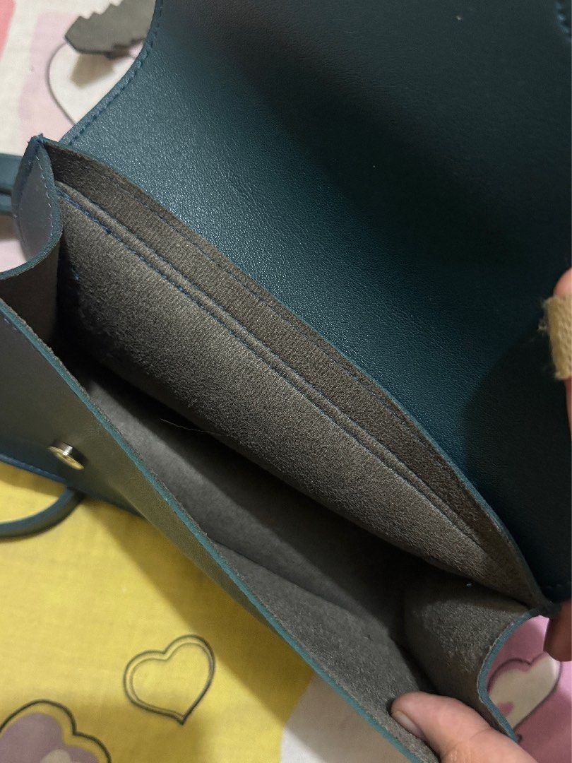 Straightforward DVL Noiva Crossbody Bag (Category: Cross-body Bags) located in Manila. Submitted by prem_universe (Listing ID 1415196153, Image 2). Description: - Straightforward crossbody bag - Teal color - Flap closure with buckle - Adjustable long strap - Soft interior lining - Fits phone, wallet, and small notebook rfs: bought it to match with my mom but not really my style - available for meet up (ubelt area) and same day delivery (lalamove)