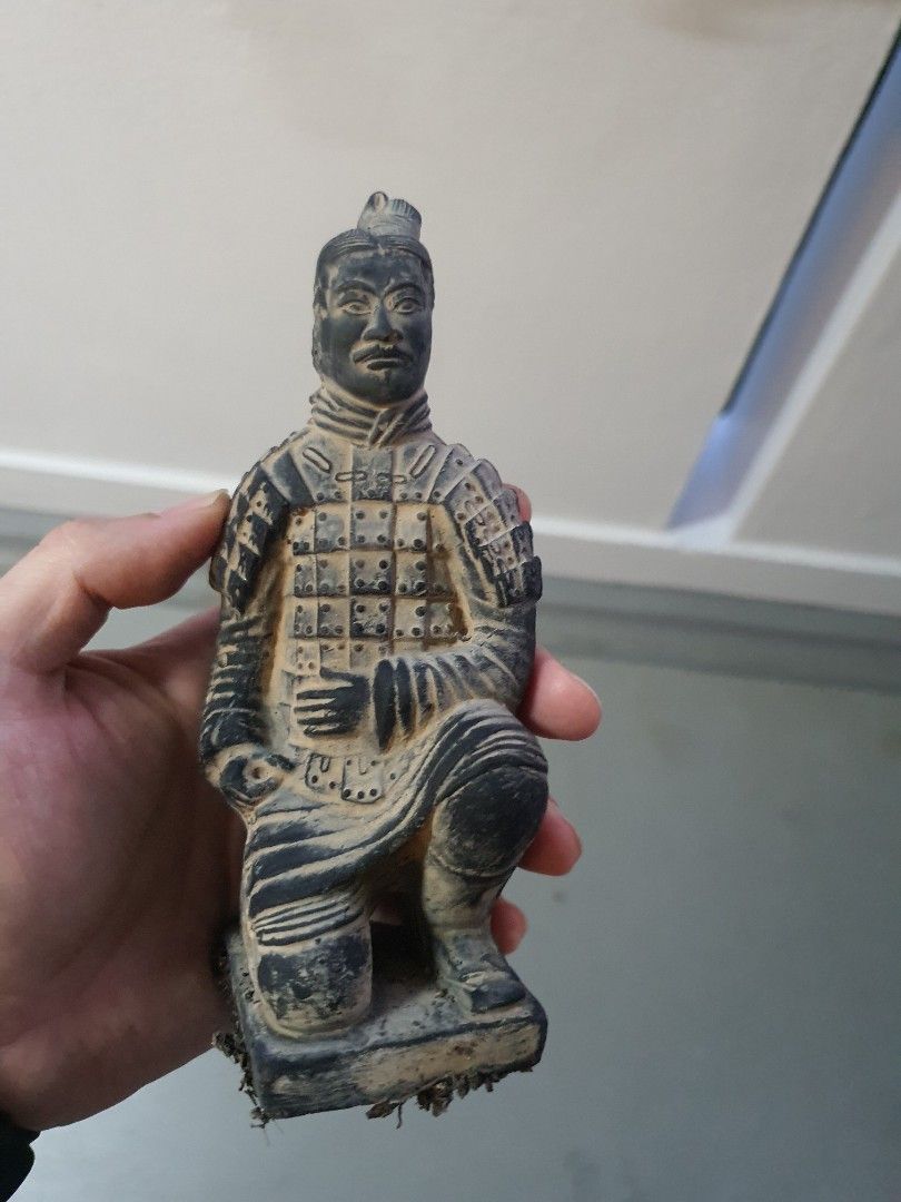 Terracotta Archer (Category: Vintage Collectibles) located in Singapore. Submitted by Button (Listing ID 1415077458, Image 1). Description: Loyal Soldier trained in archery and martial arts. Sniper trained and has ability to detect enemy by sharp hearing. He has been guarding my Aloe Vera Plants while fully camo. He is currently looking for a new Warlord to serve. Similar ones found on ebay going for 50USD. I'm letting go my fine guard at 20SGD..