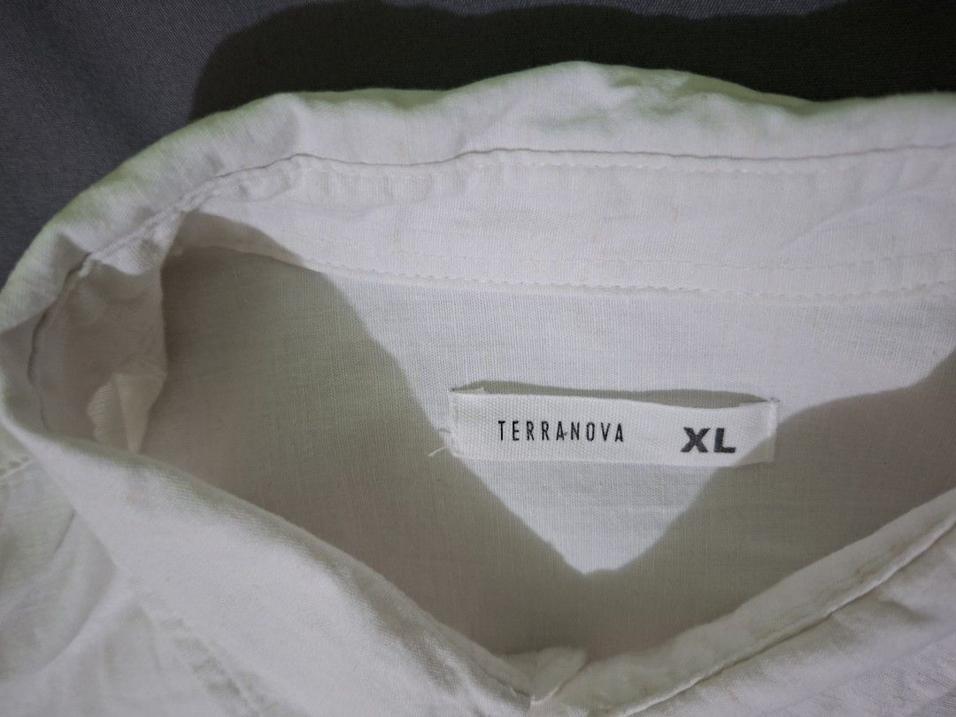 Terranova Cotton-Linen Shirt (Category: Tshirts & Polo Shirts ) located in Cabuyao City. Submitted by jj6316 (Listing ID 1415087284, Image 3). Description: - Terranova white long sleeve shirt - Size: XL - Material: Cotton-linen blend - Features: Button-down, classic collar, roll-up sleeves - Style: Casual or smart-casual.